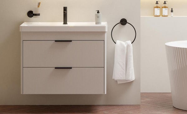 Reed wall hung vanity unit with fluted finish on drawer fronts